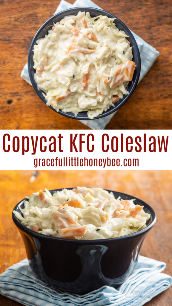 Small cup of coleslaw in a black plastic cup on top of a blue gingham napkin.