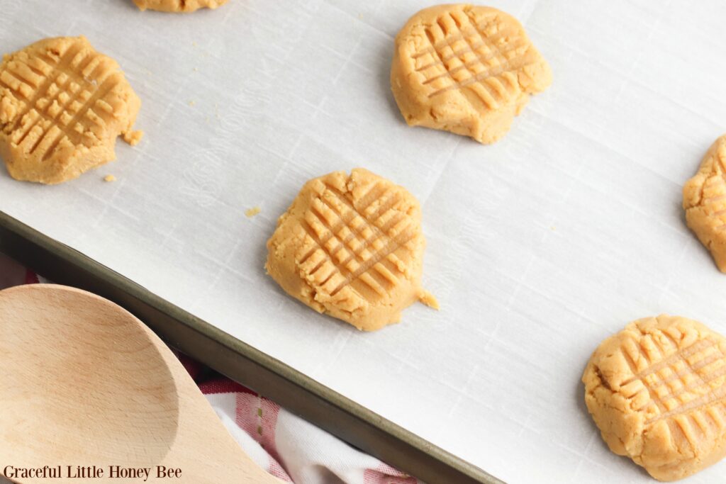 Peanut Butter Cookie dough on a cookie sheet.