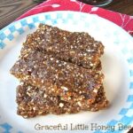 Homemade Energy Bars stacked on a white plate.