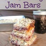 Blackberry Jam Bars on wooden cutting board.