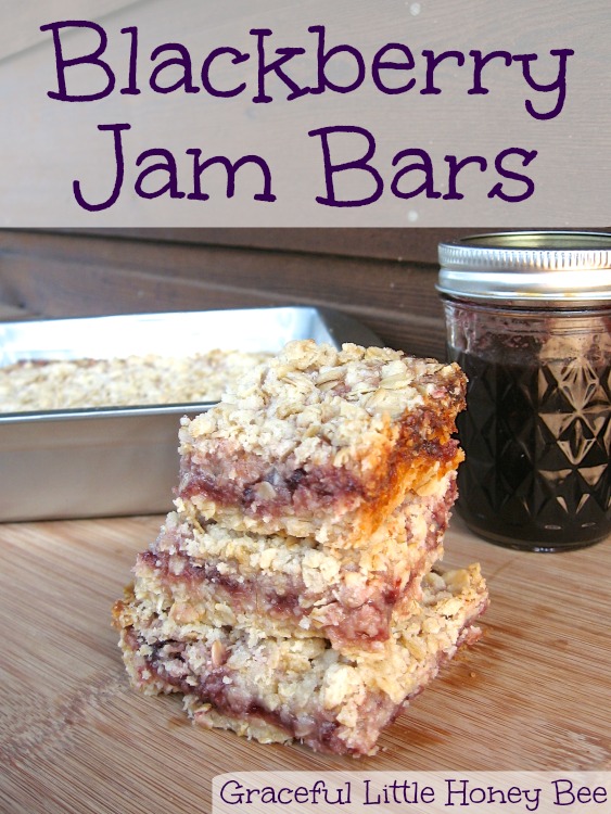 Blackberry Jam Bars on wooden cutting board.