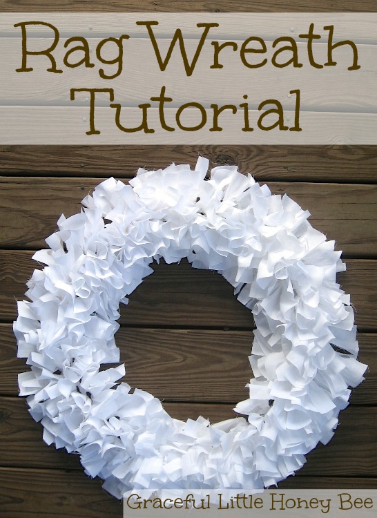 White rag wreath on a wooden background.