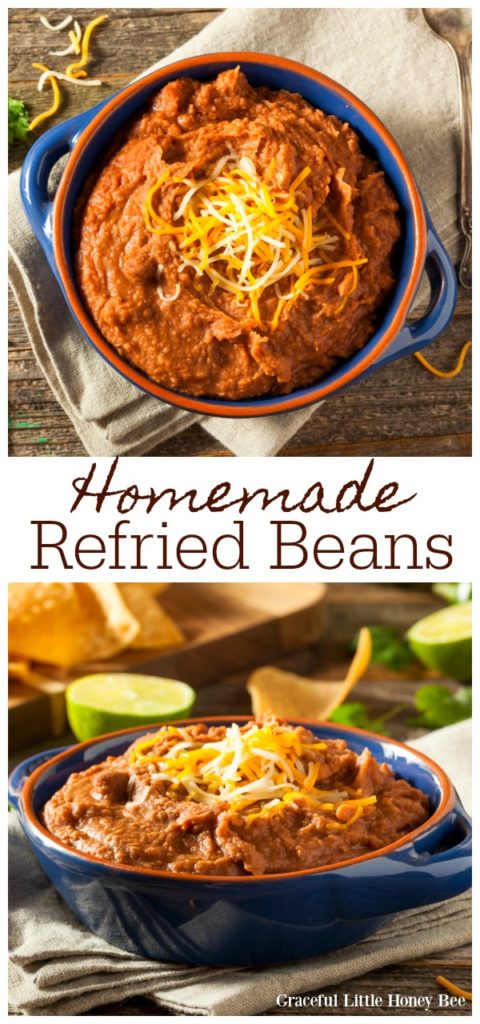 Homemade refried beans in a blue bowl topped with shredded cheese.