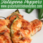 Close up of jalapeno poppers sitting on a white plate.