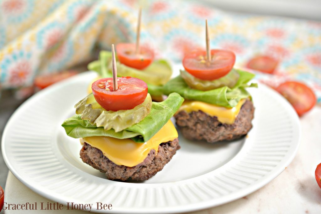 These Low Carb Cheeseburger Bites are a keto friendly recipe for mini bunless burgers that everyone is sure to love.