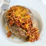 Try this super easy and kid-friendly recipe for Cheesy Sloppy Joe Baked Potatoes that makes a quick weeknight meal!