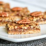 Try these super delicious Homemade Pecan Pie Bars made with an easy shortbread crust and a quick pecan pie topping for a fun fall dessert on gracefullittlehoneybee.com