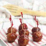 These Slow Cooker Cranberry Meatballs are easy to make and are great for serving at your next Christmas party or holiday event! Find the recipe at gracefullittlehoneybee.com