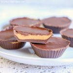 Peanut Butter Chocolate Keto Fat Bombs on a white plate.
