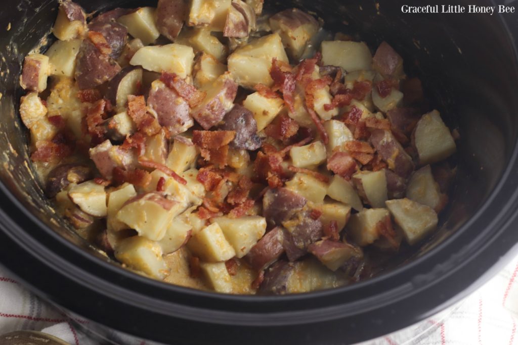 Cooked cheesy bacon ranch potatoes in the slow cooker.