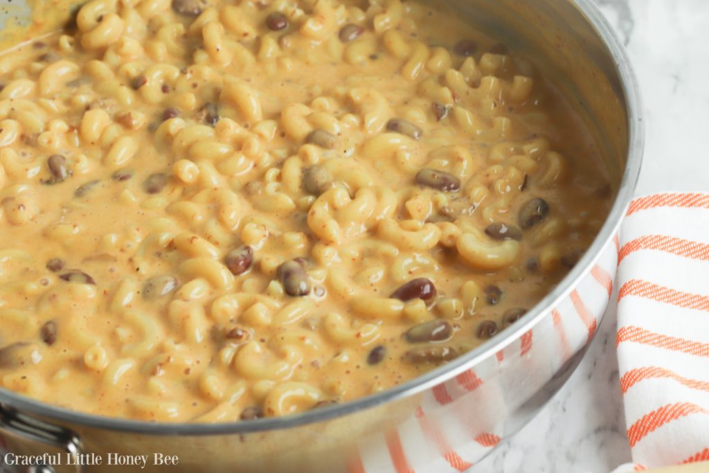 Finished chili mac in large silver skillet.