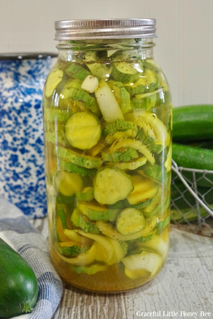 Finished pickles in a half gallon jar.