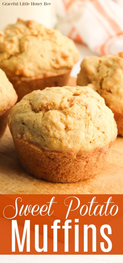 Sweet potato muffins on a wooden cutting board.