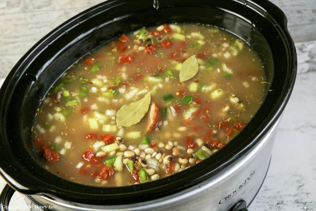 All ingredients in slow cooker, except rice, before cooking.