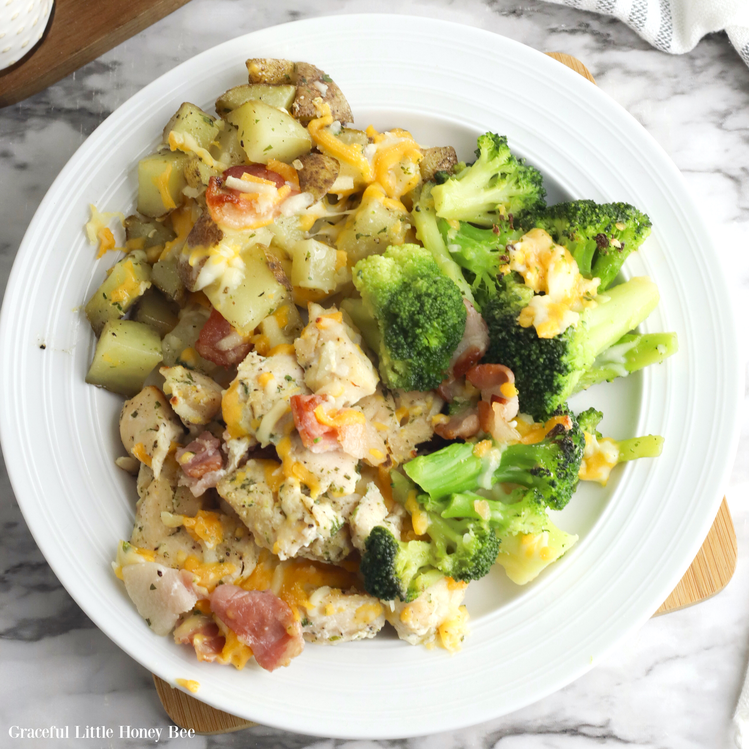 Chicken Bacon Ranch and Broccoli on a white plate.