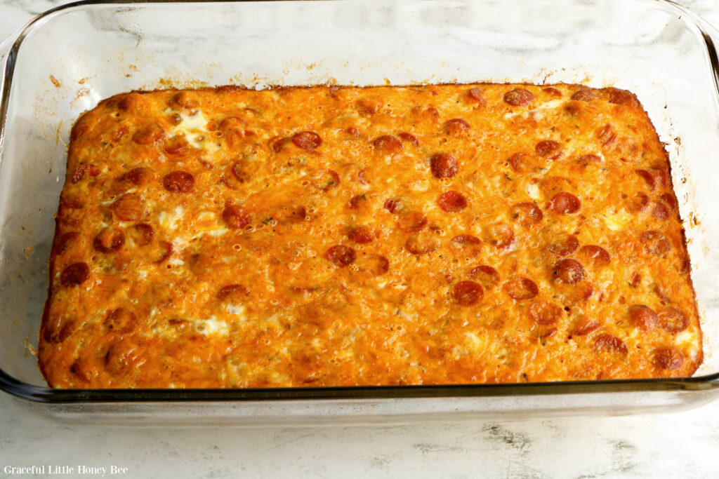 Baked Pepperoni Pizza Casserole in a glass baking dish.