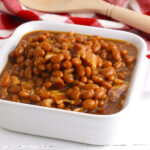 Brown Sugar Baked Beans in a white square baking dish.