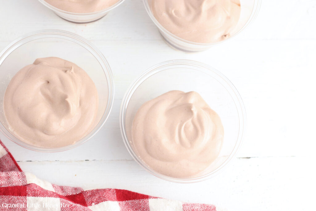 Whipped topping and pudding mixture layered on top of graham cracker crumbs.