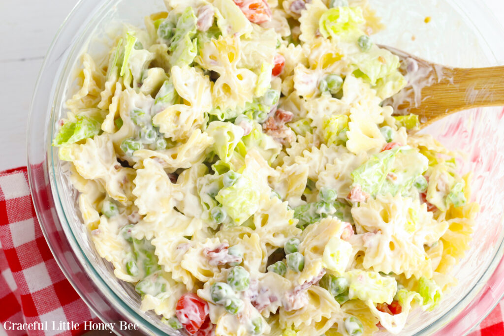 BLT Pasta Salad in a large clear glass bowl.