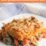 A serving of Sweet Potato Shepherds Pie on a white plate.