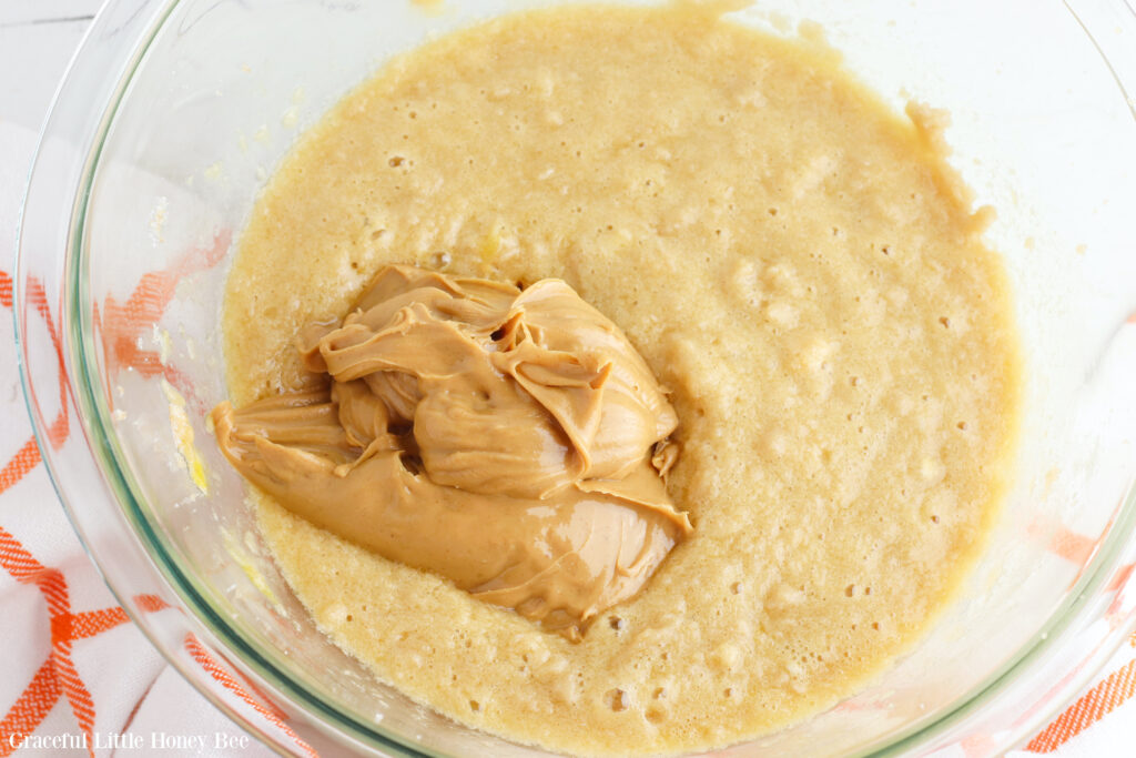 Wet batter with glob of peanut butter sitting on top.