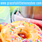 Close up of a bread machine donut with sprinkles.