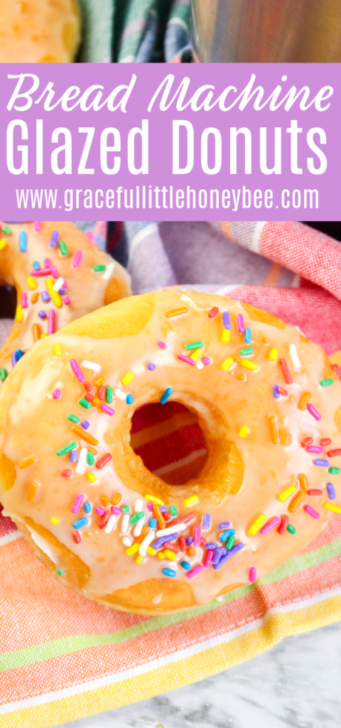 Close-up of a bread machine donut with glaze and sprinkles.