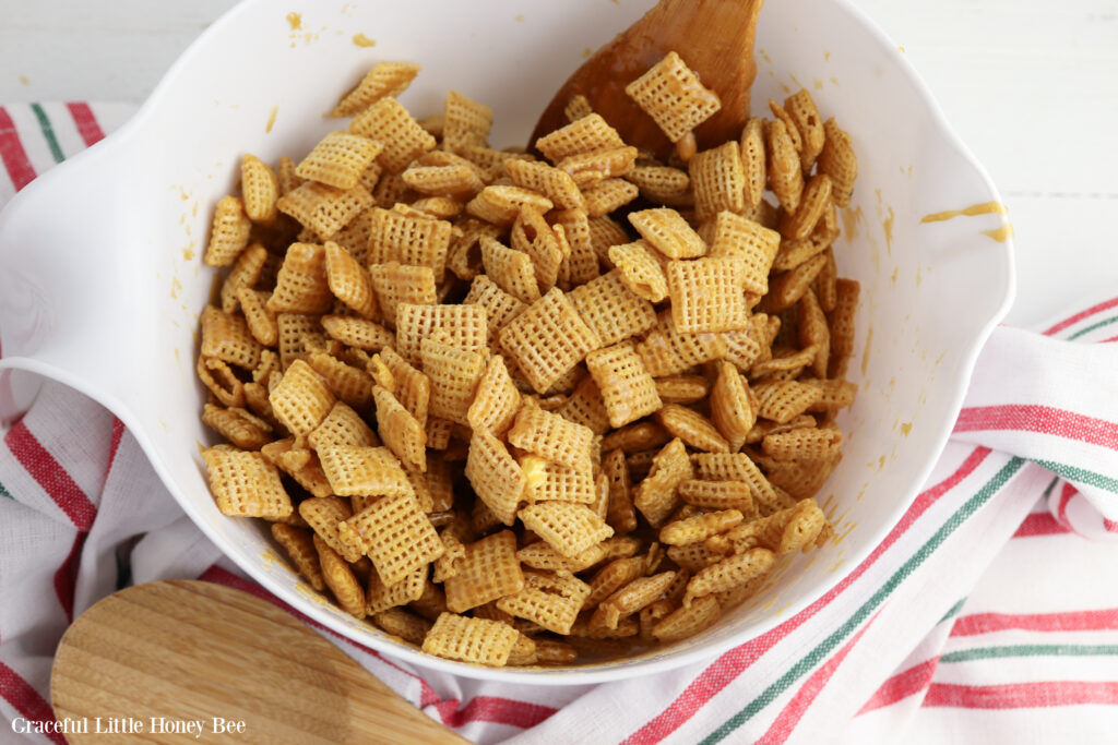 White mixing bowl with chex mix.