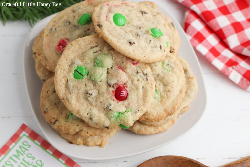 Prepared M&M Cookies on a white plate.