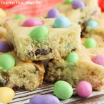 A close up of Easter Egg Cake Mix Cookie Bars cut into slices and sitting in a pile.