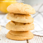 Stack of four sugar cookies.