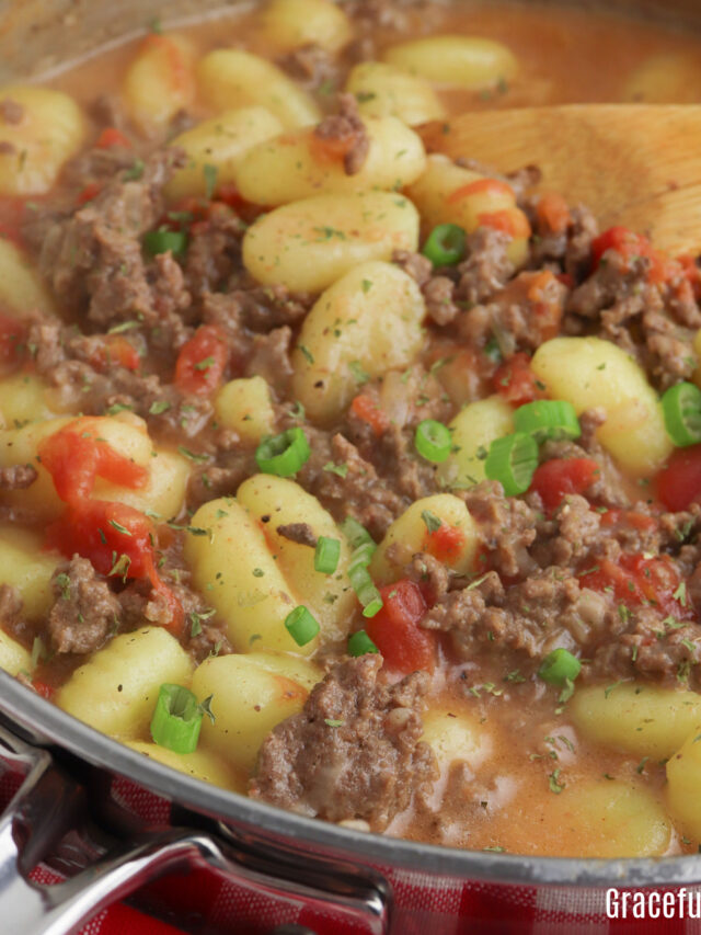 Close up of Ground Beef Gnocchi in a stainless steel skillet.
