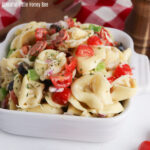 Tortellini Pasta Salad in a square white dish.