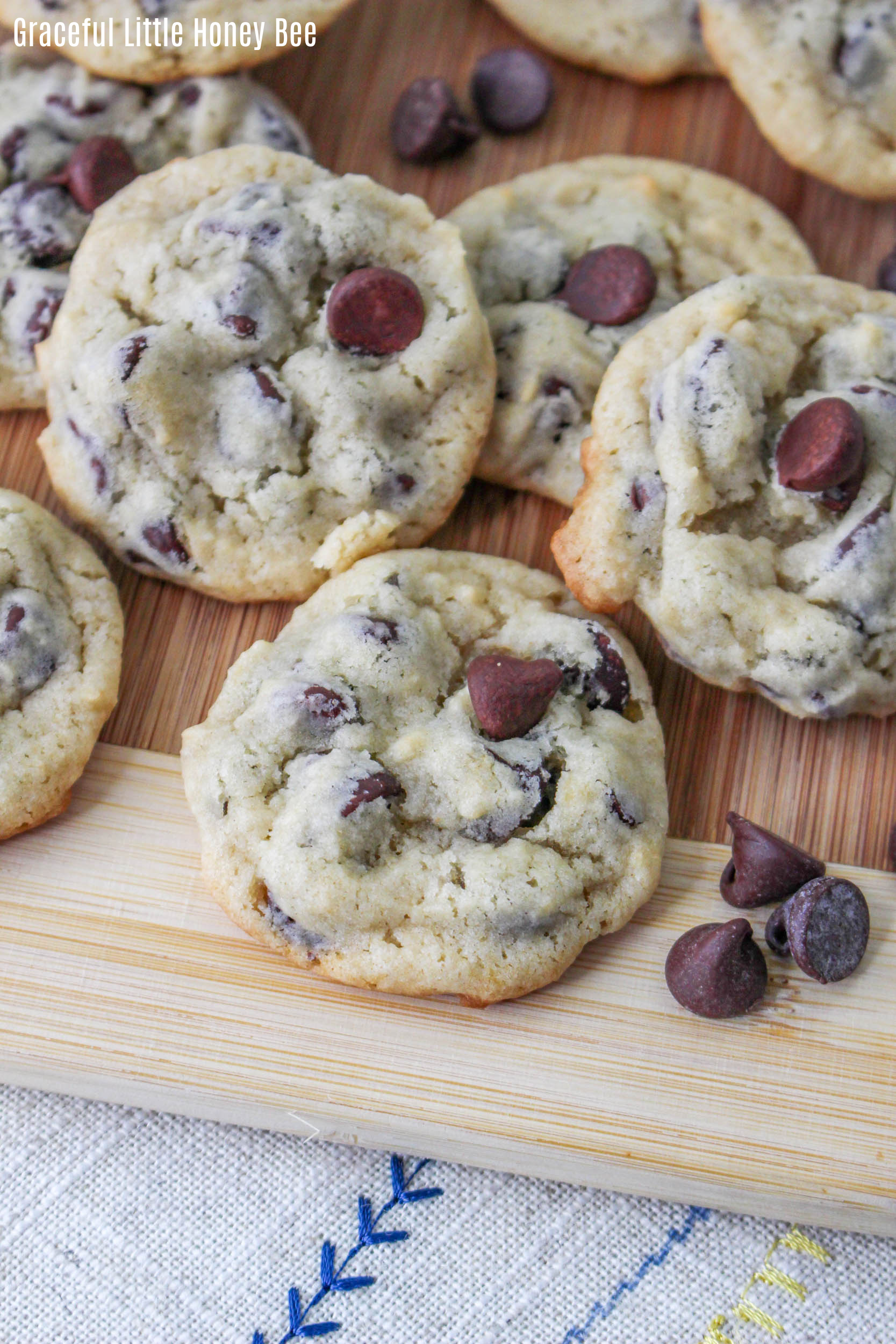 Close up of a pile of chocolate chip cookies.