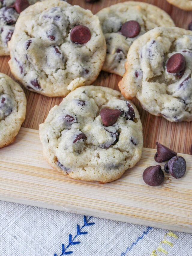 Close up of a pile of chocolate chip cookies.