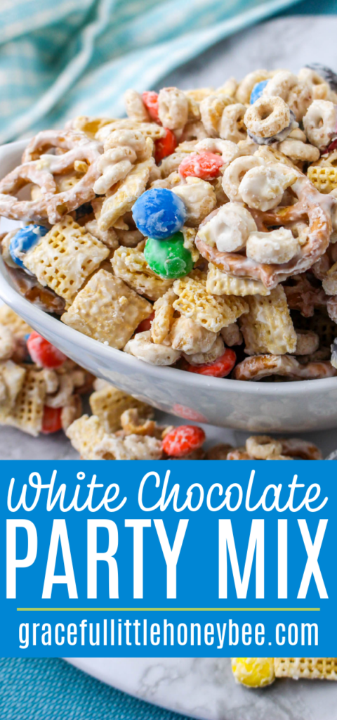 Close up view of a bowl of White Chocolate Party Mix.