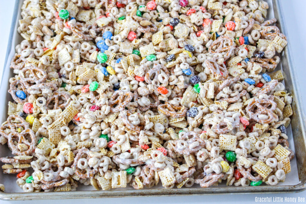 Party mix on a baking sheet.