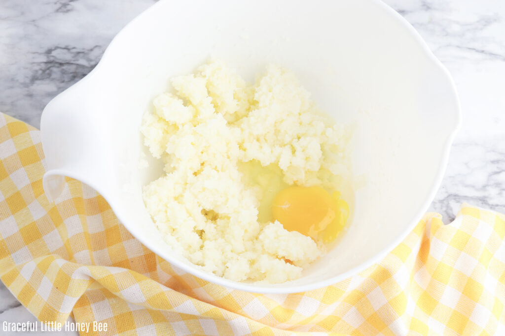 Butter and sugar mixture with an egg.