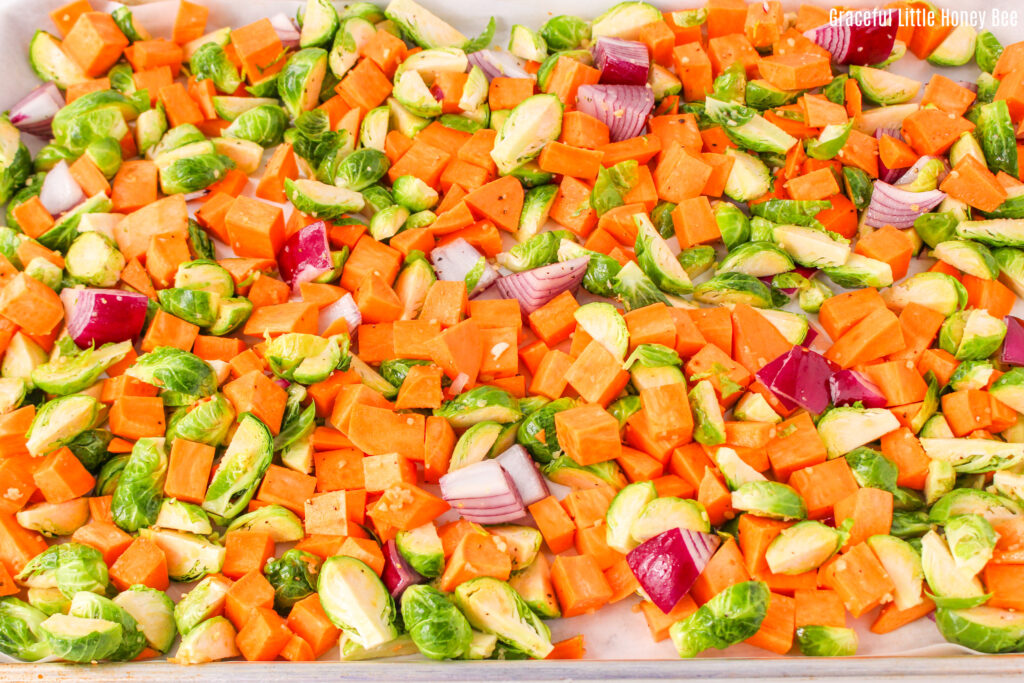 Chopped vegetables on a sheet pan.