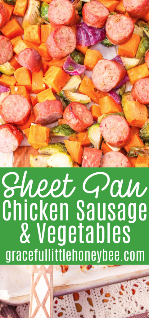 A close up view of a sheet pan filled with sausage and vegetables.