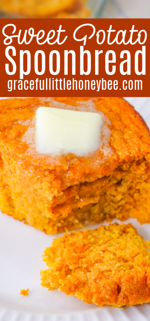 A close up view of a slice of spoonbread with a pat of butter on top.