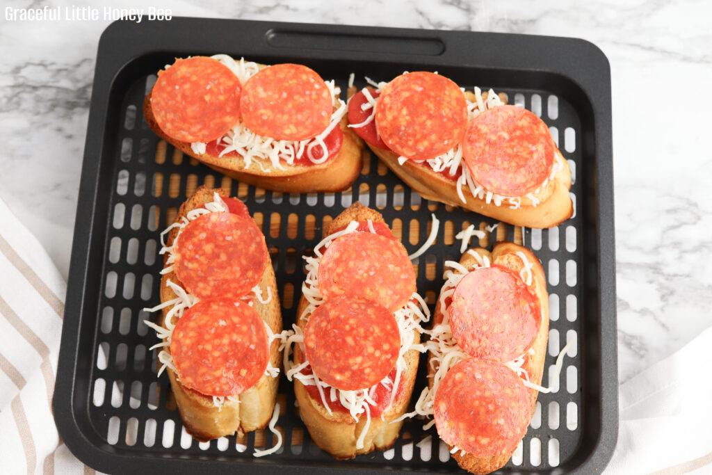 Garlic Bread Pizzas before going into the oven.