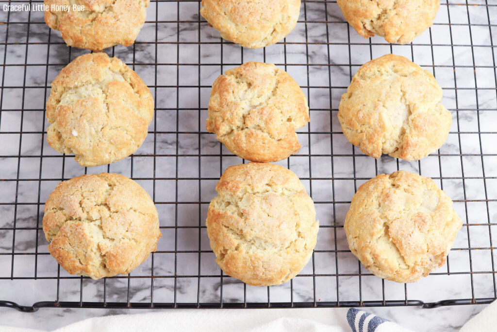Golden brown shortcakes sitting on drying rack.