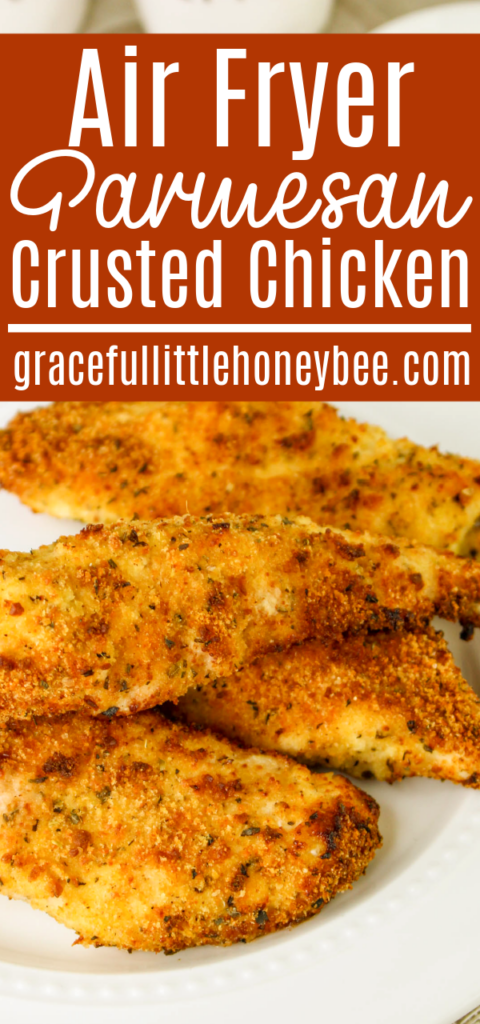 A pile of air fried Parmesan crusted chicken sitting on a white plate.