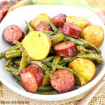 Bowl full of sausage, green beans and potatoes.