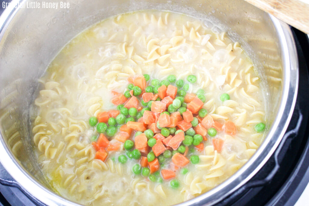 Cooked noodles with veggies in Instant Pot.