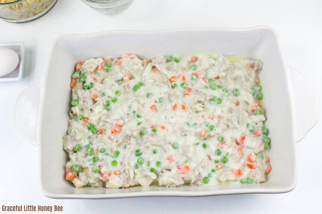 Turkey Pot Pie filling in a casserole dish.