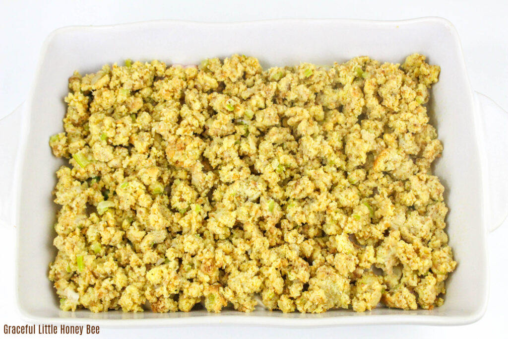 Aerial view of Turkey Pot Pie with Stuffing Crust in a white casserole dish before going into the oven.