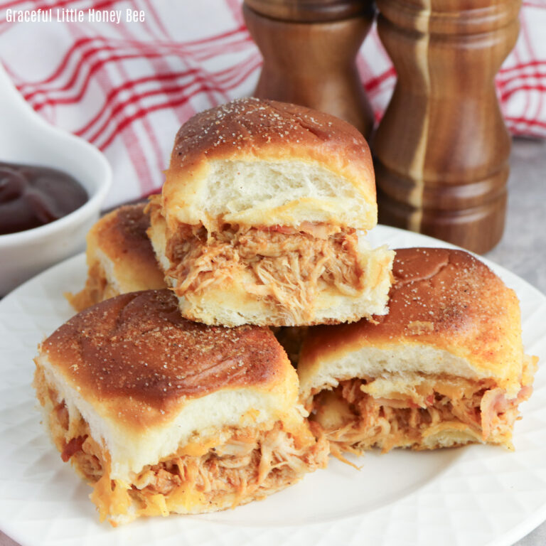 BBQ Chicken Sliders sitting on a white plate.