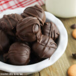 Twix Cookies piled in a white bowl.